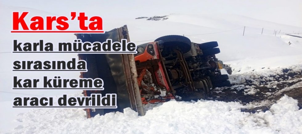 Karla mücadele sırasında kar küreme aracı devrildi